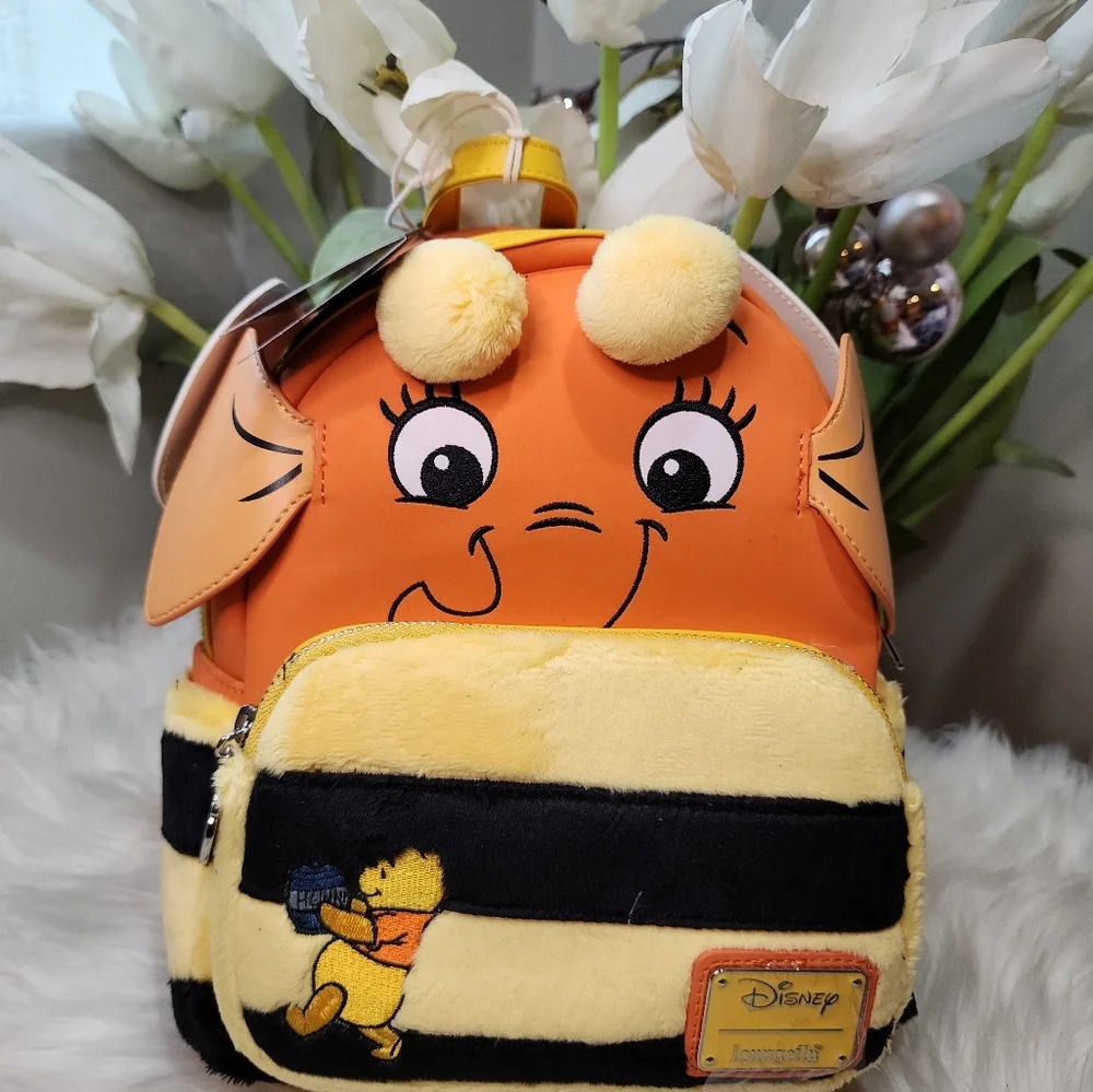 exclusive - winnie the pooh heffalump heffabee cosplay mini backpack Heffa-Dreams Heffalumps love sweet dreamsand this Loungefly Disney Winnie the Pooh Heffa Exclusive - Winnie the Pooh